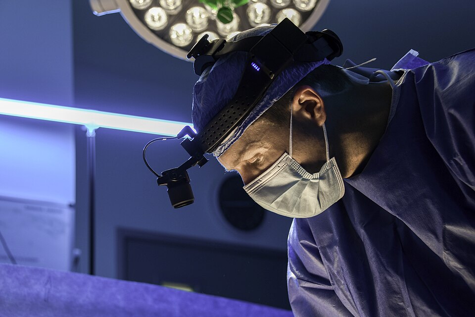 Plastic Surgeon Wearing Surgical Headlight in Operating Room.jpg