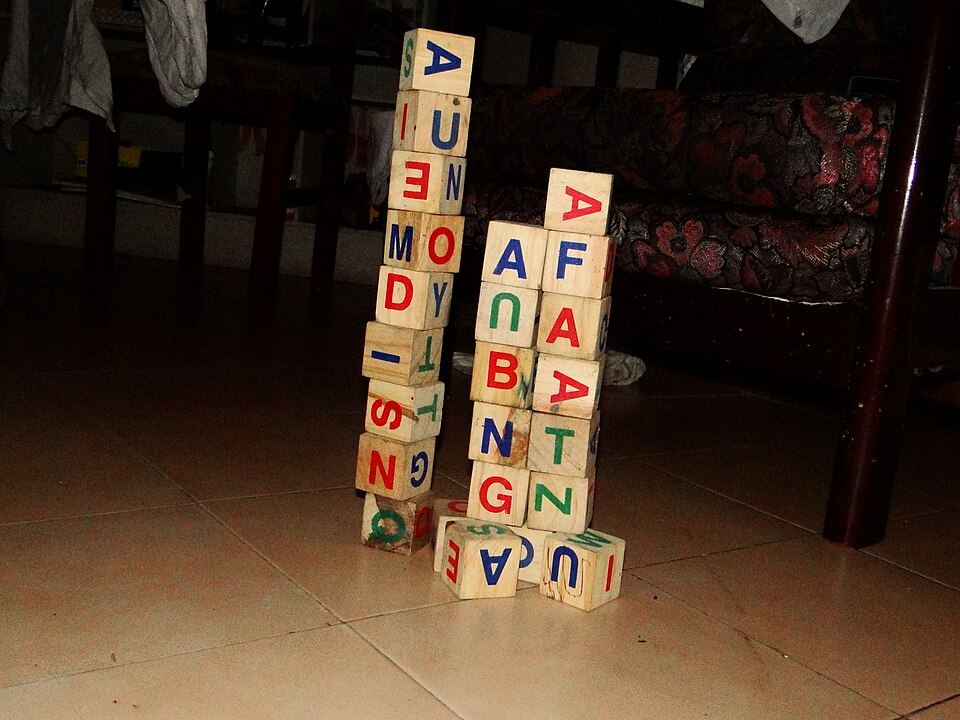 A pile of alphabet wooden blocks.jpg
