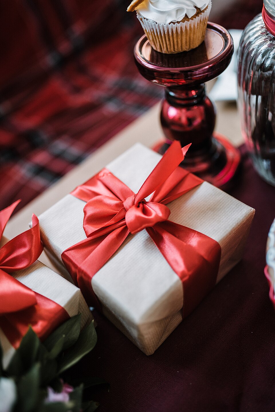 Brown gift box with red ribbon and bow.jpg