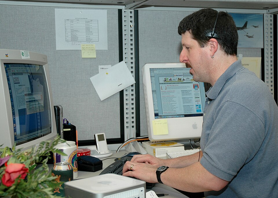 Man responds to telephone call.jpg